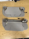 2000-2006 Nissan Sentra Driver & Passenger Side Sun Visor Pair Set Gray. Fixed Price $128.00.